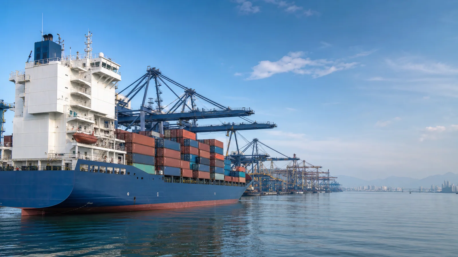 A large container vessel at a modern international port